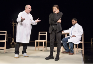 Marcello Magni, left, Kathryn Hunter and Jared McNeill in “The Valley of Astonishment,” at the Polonsky Shakespeare Center.Credit...Sara Krulwich/The New York Times